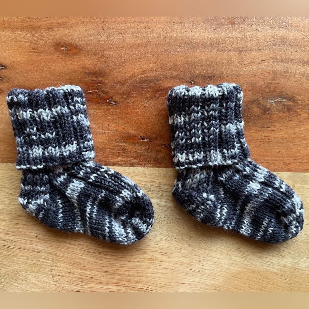 Last chance! 
Hand knit Baby Socks—that will actually stay on your baby’s feet!